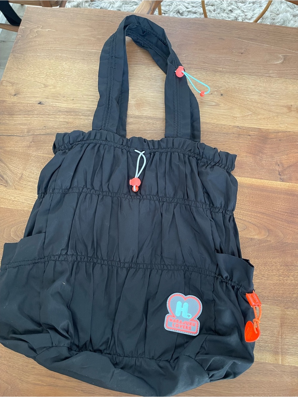 Harajuku Lovers Black Tote with Heart Patch and Coral Accents